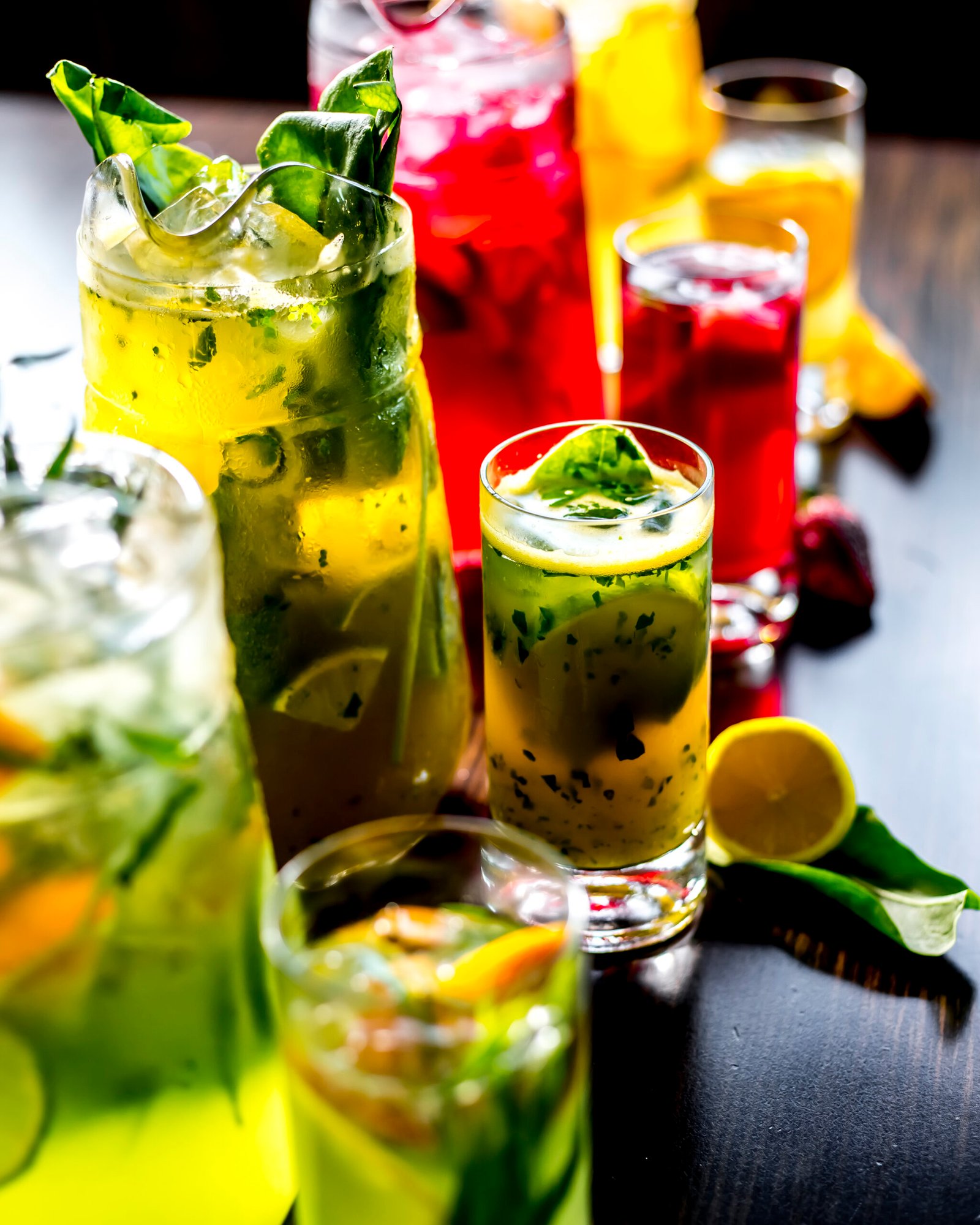 side view invigorating variety soft drinks with slice lemon strawberries table scaled